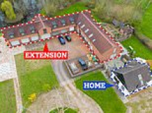 Doctor is ordered to demolish 'mega-garage' FIVE times bigger than his cottage...after claiming it was for a classic car collection that didn't exist