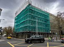 Residents claim they're being 'suffocated' after scaffolding is left surrounding their £12million block of flats for four years