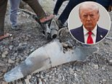 Iran shares gloating photos of US F-15E shot down by its rockets as desperate hunt for second American airman continues