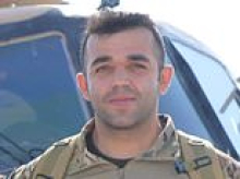 Afghan war hero who served alongside British troops is left fighting for his life after rail station 'assault' - as police arrest two teenage girls