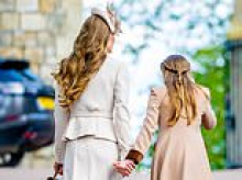 Kate and Charlotte hold hands in sweet picture as they walk from Easter Sunday Windsor service