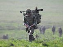 Labour accused of 'dithering' over war footing bill: Plans to bolster UK's defence are delayed until next year despite widespread conflict