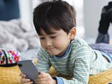 Mumsnet sparks fury from parents over 'normalising' smartphones for children after using six-year-old in marketing campaign