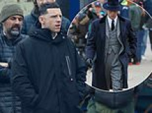 Peaky Blinders' new lead Jamie Bell unveils his drastic new haircut as he is seen on set for the first time after his role in the acclaimed gangster drama was revealed