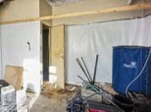 Live the high life! Mid-terraced house sells for bargain £65,000... because it used to be drugs factory