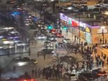 Horrified tourists visiting Chicago confronted by nightmarish Mad Max scene unfolding outside window of their Hampton Inn hotel room