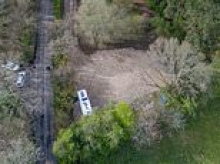 Villagers' fury over travellers' late night 'land grab': Residents accuse group who paved over field of 'riding roughshod' over planning laws and warn police 'this could get ugly'