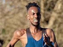 Somalian runner 'sexually assaulted girl, 18, after waiting for her friends to leave her alone at bus stop', court hears