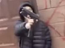 Terrifying video shows young Chicago boys clad in masks and nitrile gloves flashing their GUNS in broad daylight