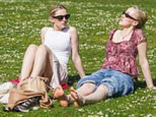 Life's a beach! Sun-starved Britons flock to the seaside as temperatures reach 26C on hottest day of the year so far