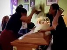 Over my dead body! Women brawl on top of dead man's coffin at his funeral after realising he was dating both of them