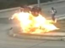 Nightmarish moment motorcycle explodes, setting its driver on fire