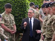 Kemi Badenoch brands Keir Starmer 'all mouth and no trousers' on defence as he jets to the Gulf despite failing to produce vital plan for Britain's military