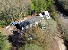 'One law for them, another law for us': Villagers condemn police for 'aiding and abetting' traveller land grab after officers 'arrested residents for trying to stop caravans moving in'