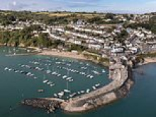 Families in Welsh seaside town raise £6,000 to mount legal challenge stop 30 affordable homes being built amid fears 'people from Birmingham' could move in