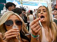 Aintree ladies look worse for wear as they slump in car park after downing drinks on raucous day at Grand National