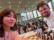 Chess player who took selfie with World No.1 before he snitched on her for using phone THANKS him and insists she has 'no hard feelings'