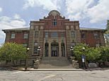 Coroner accused of stealing valuables from the dead pleads no contest