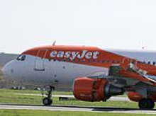 Passengers are 'left vomiting and passing out' after becoming stranded in Milan airport while trying to fly home to UK 'because of border check queues'