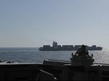 Iran warns it will 'soon retaliate' after US forces seized Iranian-flagged cargo ship