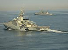 Putin sends frigate through the Channel to guard shadow ship 'containing weapons'