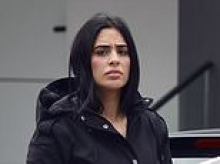 TikTok star breaks cover outside her parents' western Sydney home after being charged over an alleged wild brawl in a hair salon