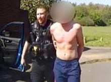 Moment bare-chested speeding driver hurls himself out of a 50mph moving car before trying to flee police on foot