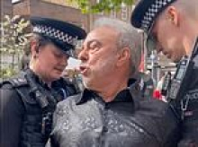 Christian pastor is arrested for 'criticising Islam' while preaching in Watford town centre - as police officer tells him 'in the name of Jesus, get in the car'