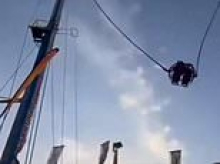 Moment fairground ride's cable SNAPS sending thrill-seekers smashing towards the ground in Spain