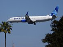 United Airlines flight 3000 feet in the air COLLIDES with 'red, shiny' drone in airspace