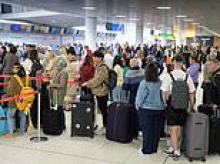 Summer of discontent... Now unions threaten STRIKE ACTION at major airport during World Cup and Commonwealth Games