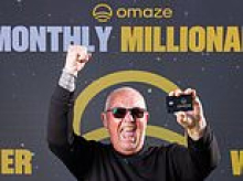 Lorry driver, 66, celebrates becoming Omaze millionaire a week after retiring by getting a tattoo of raffle firm's logo
