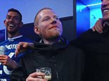 Ipswich's A Team! Ed Sheeran joins in the celebrations after beloved club's Premier League promotion as he drinks Guinness in the dressing room and stars belt out rendition of his hit song