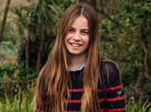 Princess Charlotte marks her 11th birthday with a carefree smile in a daisy-strewn field in charming new portrait: See her over the years
