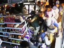 Wild moment horde of looters descends on Northern Territory convenience store following death of five-year-old and capture of her accused killer