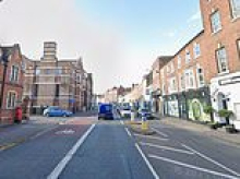 Man, 23, is arrested on suspicion of rape after woman was attacked in an alleyway