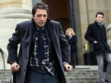 Businessman who was jailed for murdering his girlfriend at a luxury Paris hotel is now back in prison... for attacking his father
