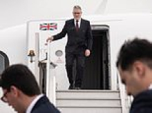 PM flies away from trouble: With local ballots just days away, Starmer jets off to European summit as Labour members push for Britain to rejoin EU
