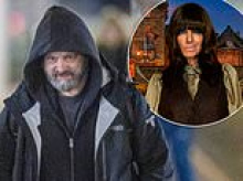 Michael Sheen already resembles a Traitor as he arrives in Inverness with his hood up to film the star-studded Celebrity series