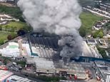 Fire breaks out at Warburtons bread factory with smoke billowing into the sky as TV star Bank of Dave 'offers to 'rescue people' in his helicopter