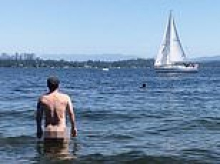 Notorious Seattle public beach where locals go to have sex must allow women to roam topless, judge rules, despite wealthy neighbors' fury