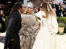 Blue Ivy, 14, ignores two assistants and dad Jay Z's repeated requests to remove her sunglasses during Met Gala debut as fans declare 'she answers to nobody'