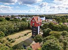 Unique photos reveal Britain's weirdest tourist attractions - including a fairy glen, 'house in the clouds', and a pyramid built by Queen Victoria