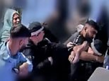 Man tells court he struck firearms officer at Manchester Airport because he felt 'under attack' and was trying to defend his brother from police 'aggression'