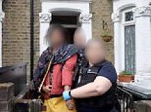 Man and woman are arrested after legal advisers told asylum seekers to pretend to be gay if they wanted to stay in the country
