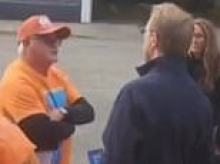 How a campaign poster sparked a scuffle between a One Nation volunteer and Liberal Senator James Paterson at polling booth