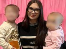 Woman left fighting for life after being found alongside her young kids in car suffering 20 stab wounds