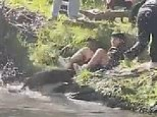 Moment boy, 8, is attacked by rabid BEAVER while fishing in river