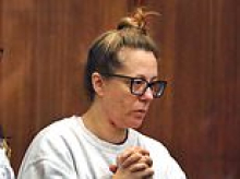 Divorce-stricken acupuncturist accused of murdering her children at $1m home is picture of misery as she pleads NOT guilty in court