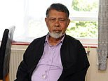 Migrant on disability benefits is allowed to stay in retirement home with his younger wife and twins until housing association finds new place for them to live...after saying eviction would breach HIS human rights